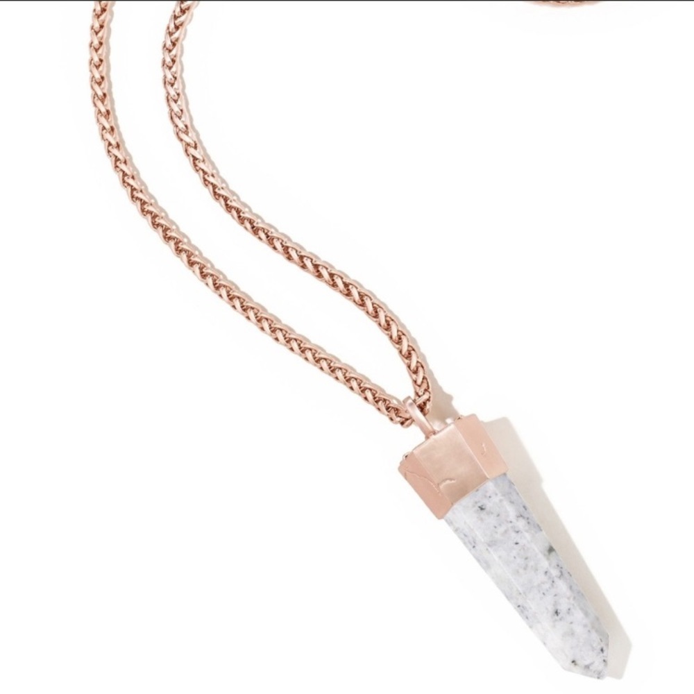 Kendra Scott Jayce rose gold pendant necklace.
